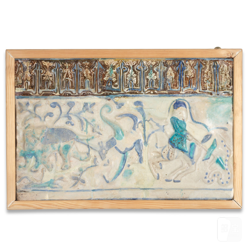 A Kashan lustre moulded pottery tile